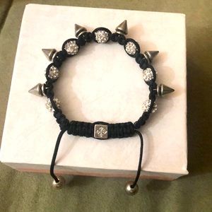 Spikes on a bracelet. Crystals.